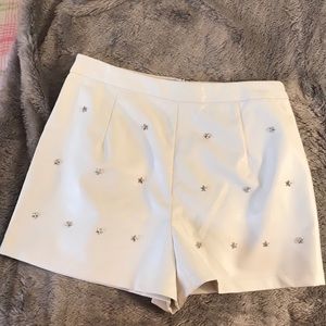 White faux leather star high waist shorts